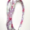 Diadema niña con lazo floral