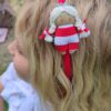 Diadema para niña vestida con mono rojo